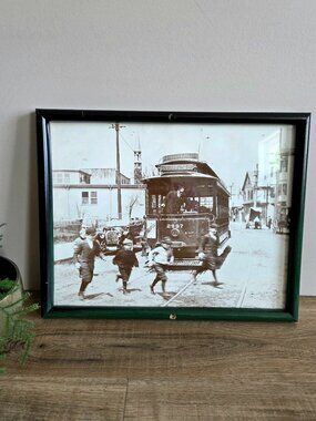 Vintage print picture of trolley of end of 19th century and running kids.